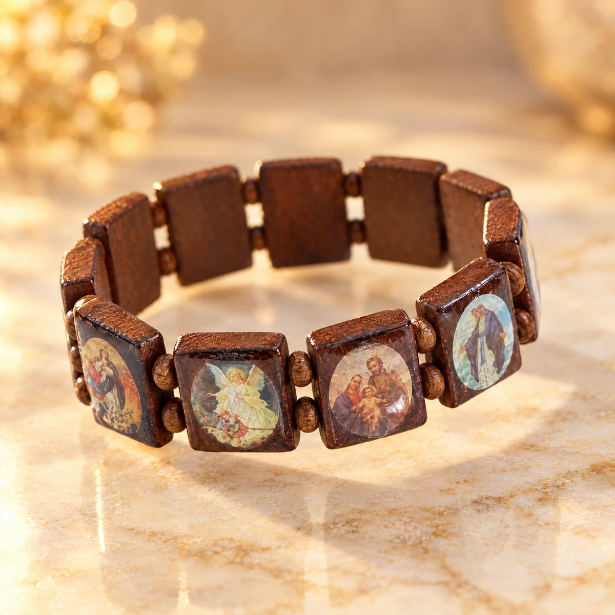 Brown wooden saints rosary bracelet on cream marble